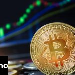 Bitcoin currency investment with value rising daily.  Laptop com